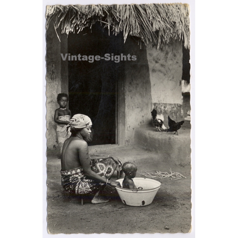 Ivory Coast: Afrique Noire La Toilette de Bébé Tribal Scars Ethnic (Vintage RPPC 1963)