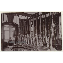 Gun Shop Exhibition: Hunting Rifles & Shotguns (Vintage RPPC Sepia ~1910s/1920s)