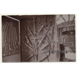 Gun Shop Exhibition: Crossbows, Rifles & Pistols (Vintage RPPC Sepia ~1910s/1920s)