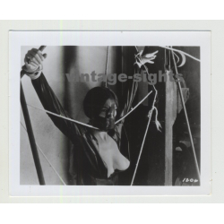 Busty Female In Lacquer Suite Tied In Torture Machine / Mask - BDSM (Vintage Amateur Photo)