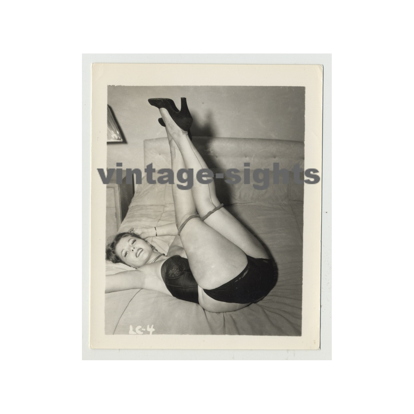 Sexy Pinup Girl On Her Back Legs Up Tights Vintage Photo 1950s sexy-pinup-girl-on-her-back-legs-up-tights-vintage-photo-1950s