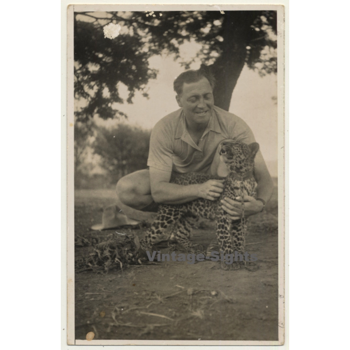 Africa: Man Caresses Young Leopard (Vintage RPPC ~1950s)