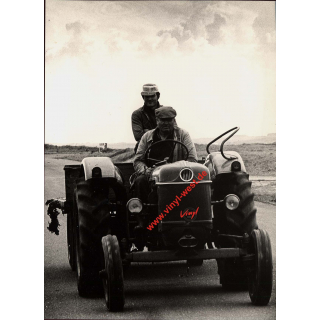 Two Farmers On Tractor