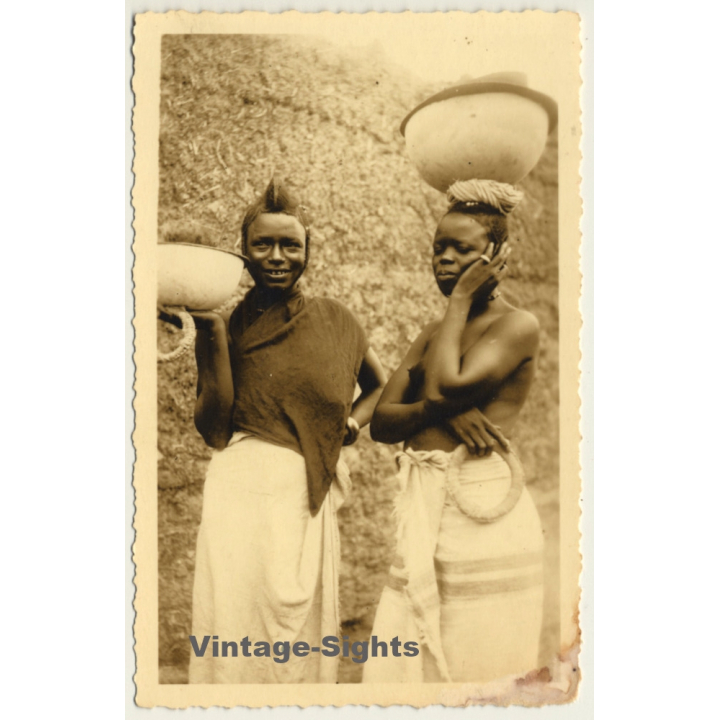 2 Native African Females Head-Carrying Goods / Risqué - Ethnic (Vintage RPPC)