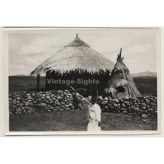 East Africa: Traditional Straw Hut & Indigenous Man (Vintage Photo ~1940s/1950s)