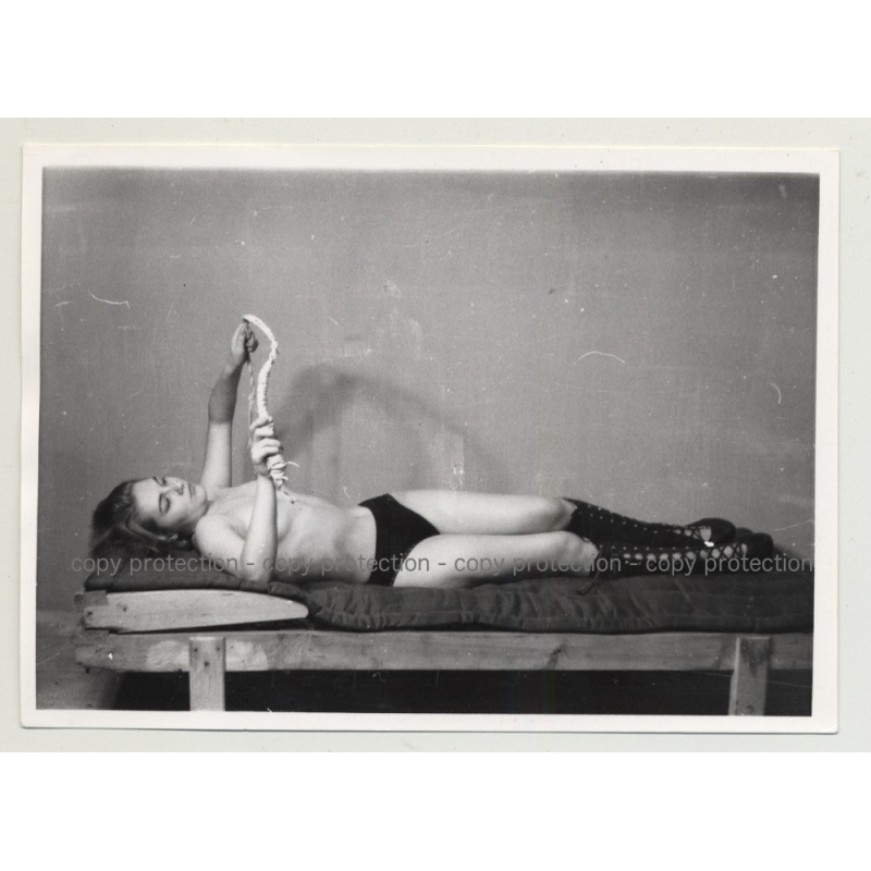 Topless Blonde On Rack Inspects Whip - Lacquer Boots (Vintage Photo B/W BDSM 1964)