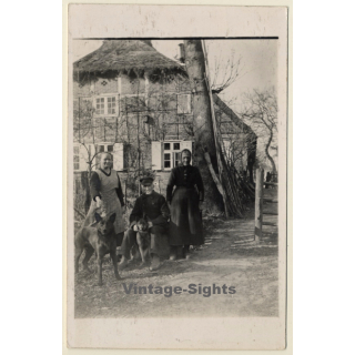 Peasant Family With 2 German Shepherd Dogs (Vintage RPPC ~1920s/1930s)