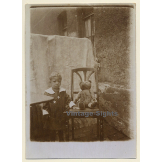 Little Girl And Her Teddy Bear In Backyard (Vintage RPPC 1910s/1920s)