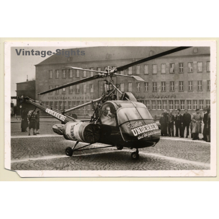 Die fliegende Underberg Flasche / Hubschrauber (Vintage RPPC ~1950s/1960s)