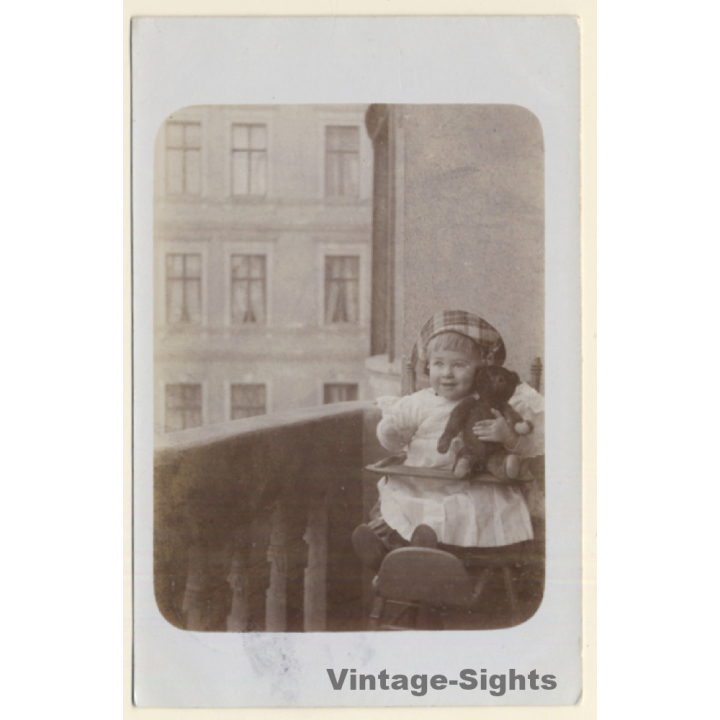 Little Baby Girl On Balcony With Teddy Bear (Vintage RPPC 1912)