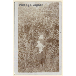 Young Boy & His Teddy Bear In Front Of Bushes (Vintage RPPC 1914)