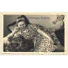 Cheeky Young Woman In Flowered Dress & Teddy Bear On Her Knees (Vintage RPPC 1941)
