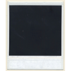 Photo Art: Cable Drum Behind Wood Wall (Vintage Polaroid SX-70 1980s)
