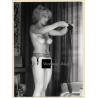 Erotic Study: Natural BLonde Nude Inspects Nylons / Suspenders (Vintage Photo GDR ~1980s)