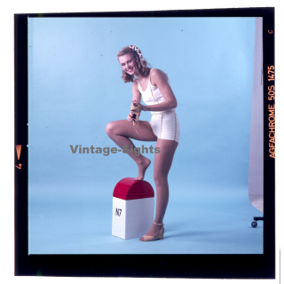 Erotic Study: Slim Blonde Pin-Up Girl Holds Up Shoe (Vintage Diapositive KORENJAK 1970s/1980s)