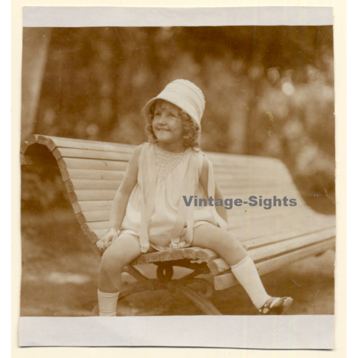 Snapshot: Happy Little Girl On Park Bench (Vintage Photo Sepia 1910s/1920s)