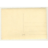 Man Embraces Nude Female On Couch / Stockings (Vintage RPPC B/W ~1920s/1930s)
