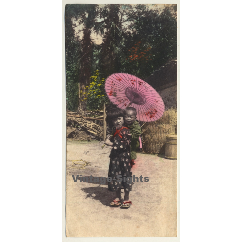 Japan: Little Girl Carries Baby Brother / Geta 下駄 - Wagasa 和傘 (Vintage Hand Tinted Photo? ~1910s)