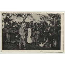Congo-Belge: Medicine Man & Indigenous Tribe (Vintage RPPC ~1920s/1930s)