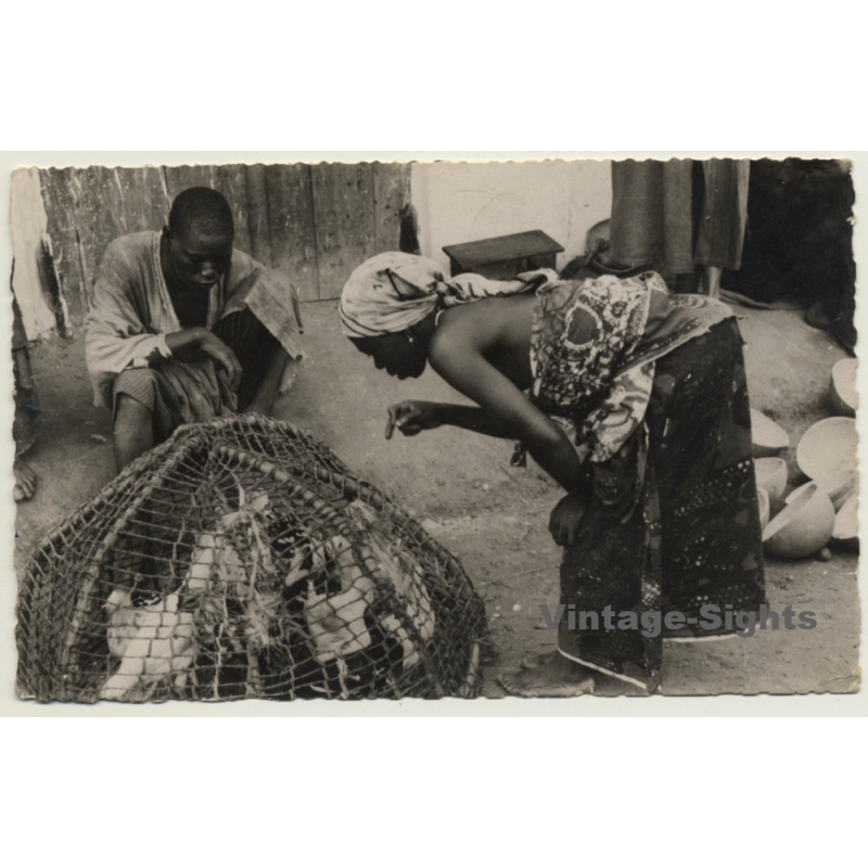 Ivory Coast: Native Woman Buys Chicken On Market (Vintage RPPC Ethnic 1951)