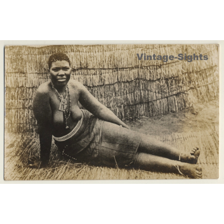 Africa: Topless Indigenous Woman In Front Of Hut / Ethnic (Vintage RPPC)