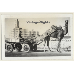 Karachi / Pakistan: 2 Men On On Camel Cart / Building (Vintage RPPC)