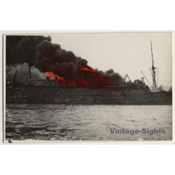 Large Burning Ship / Warship? WW2? (Vintage Hand Colored RPPC)