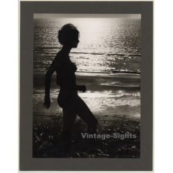 Wolfgang Klein: Woman Walking On Sea Shore / Backlit Shot...