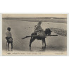 Bedouin On His Donkey Crosses Wadi (Vintage Photo PC B/W)