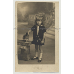 Little Girl In Sunday Costume Poses W. Stuffed Dog  (Vintage Real Photo PC)