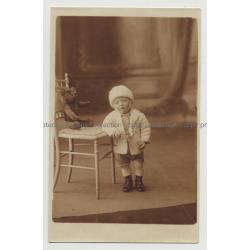 Funny Baby Boy Leans On Chair / Teddy Bear (Vintage Photo PC 1920s/30s)
