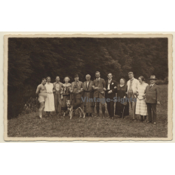 Large Dressed Up Family With German Shepherd (Vintage RPPC...
