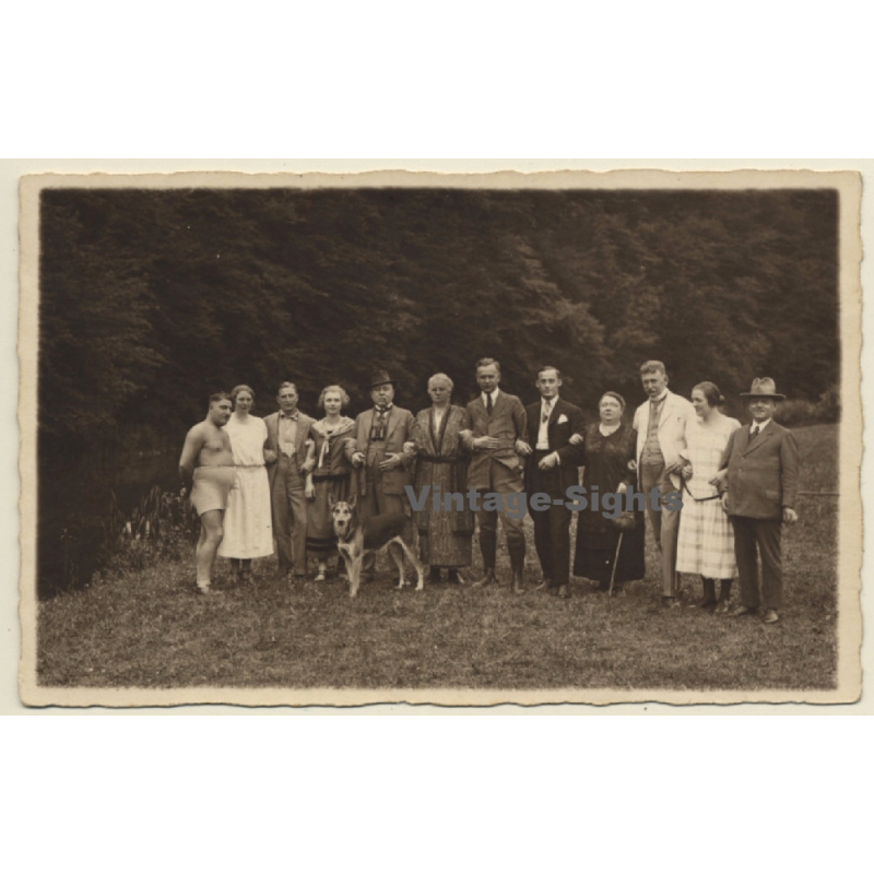 Large Dressed Up Family With German Shepherd (Vintage RPPC ~1920s/1930s)