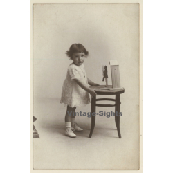 Sweet Baby Girl With Toy Soldier In Guardhouse (Vintage RPPC ~1910s)