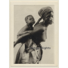 Africa: Topless Indigenous Female Carrying Baby (Vintage Photo Print)