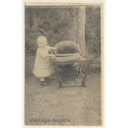 Little Baby Standing Beside High Chair / Teddy Bear (Vintage RPPC 1910s)