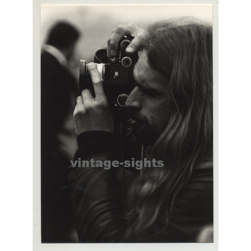 Portrait Of Long Haired Hippie Style Photographer With Nikon (Vintage Photo 1970s)