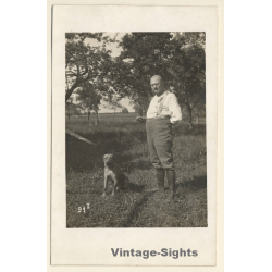 Bold Man In High Boots With Shepherd Dog (Vintage RPPC 1920s/1930s)