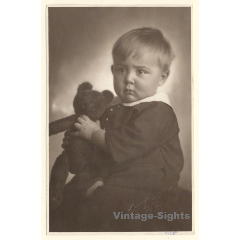 Sulky Baby Girl Holds Her Teddy Bear (Vintage RPPC ~1920s/1930s)