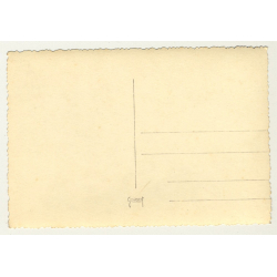 Man Embraces Nude Female On Couch / Stockings (Vintage RPPC B/W ~1920s/1930s)